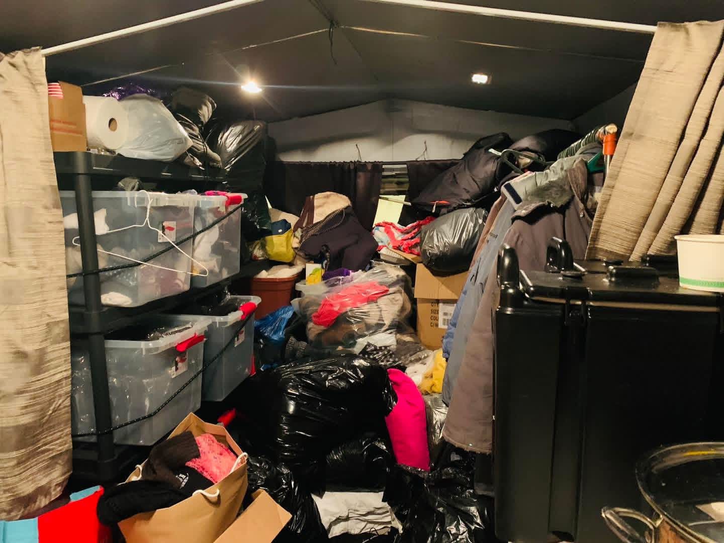 Donated coats, blankets and supplies stocked inside the bus